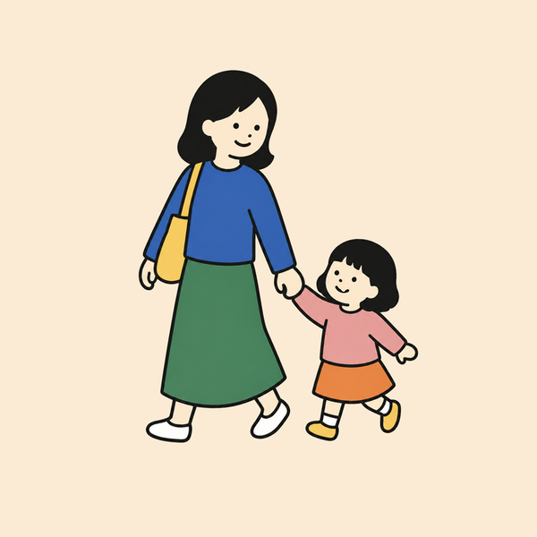 子どもの手を引く母親