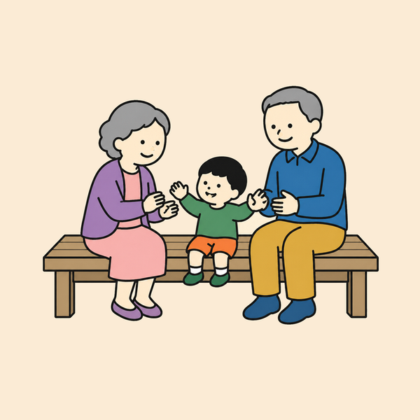 縁側で子どもと遊ぶ年配の二人