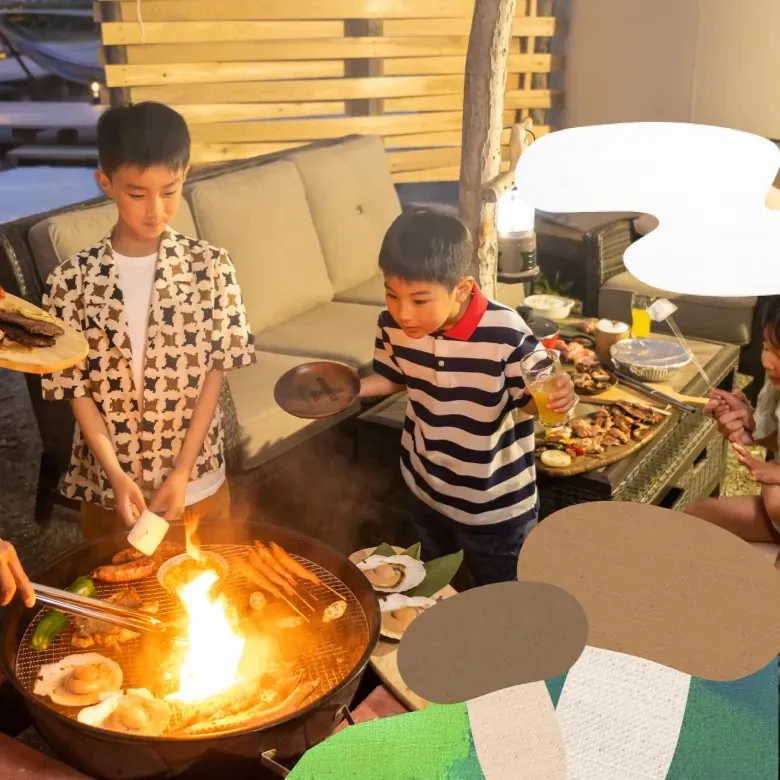 子どもたちが火を使って調理する体験
